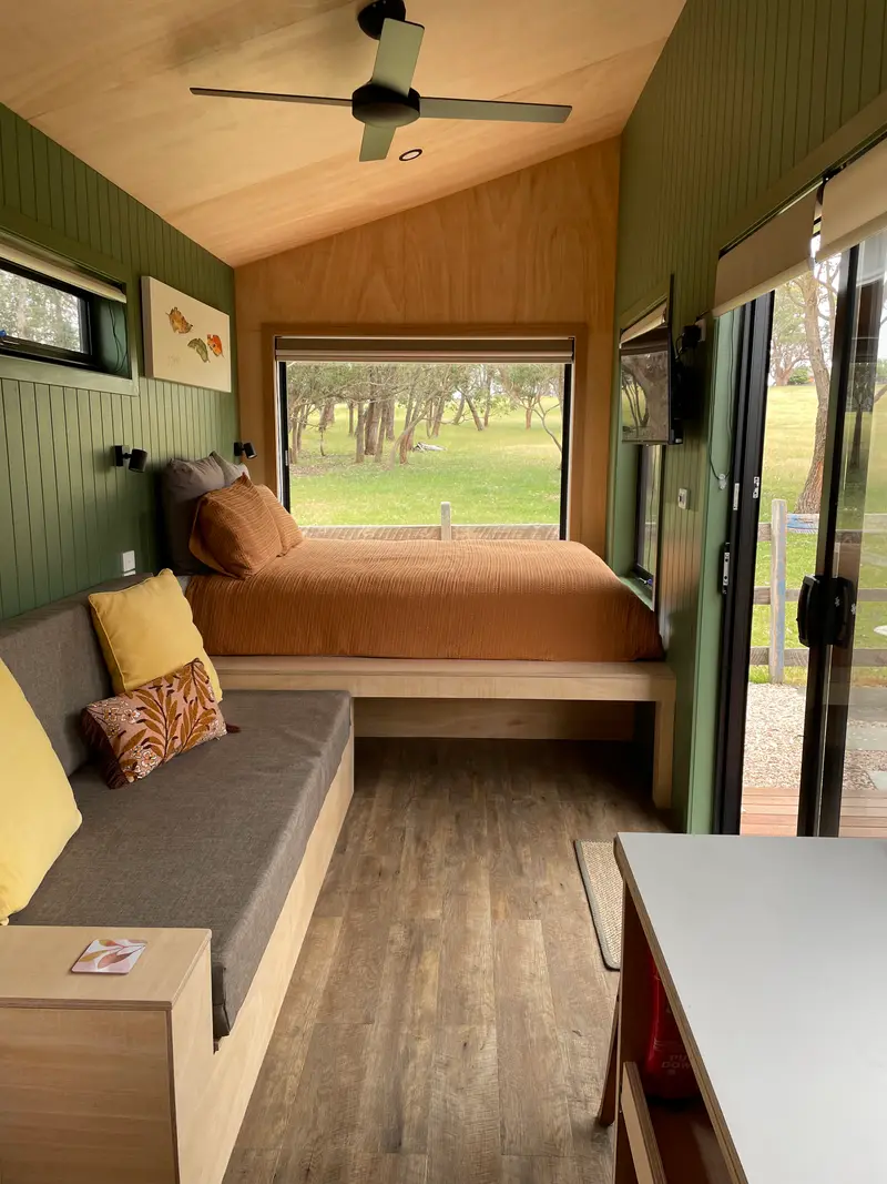Day bed and living area in The Hideaway