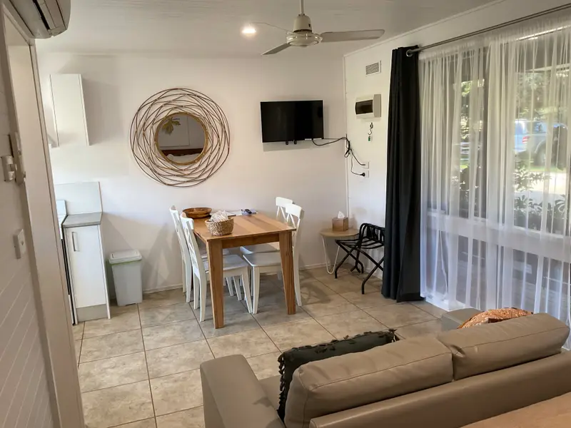 Studio 1 lounge and dining area with TV