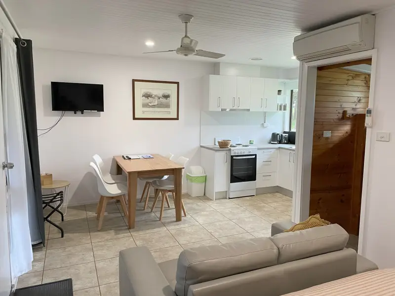 Studio 2 lounge, dining table and kitchen
